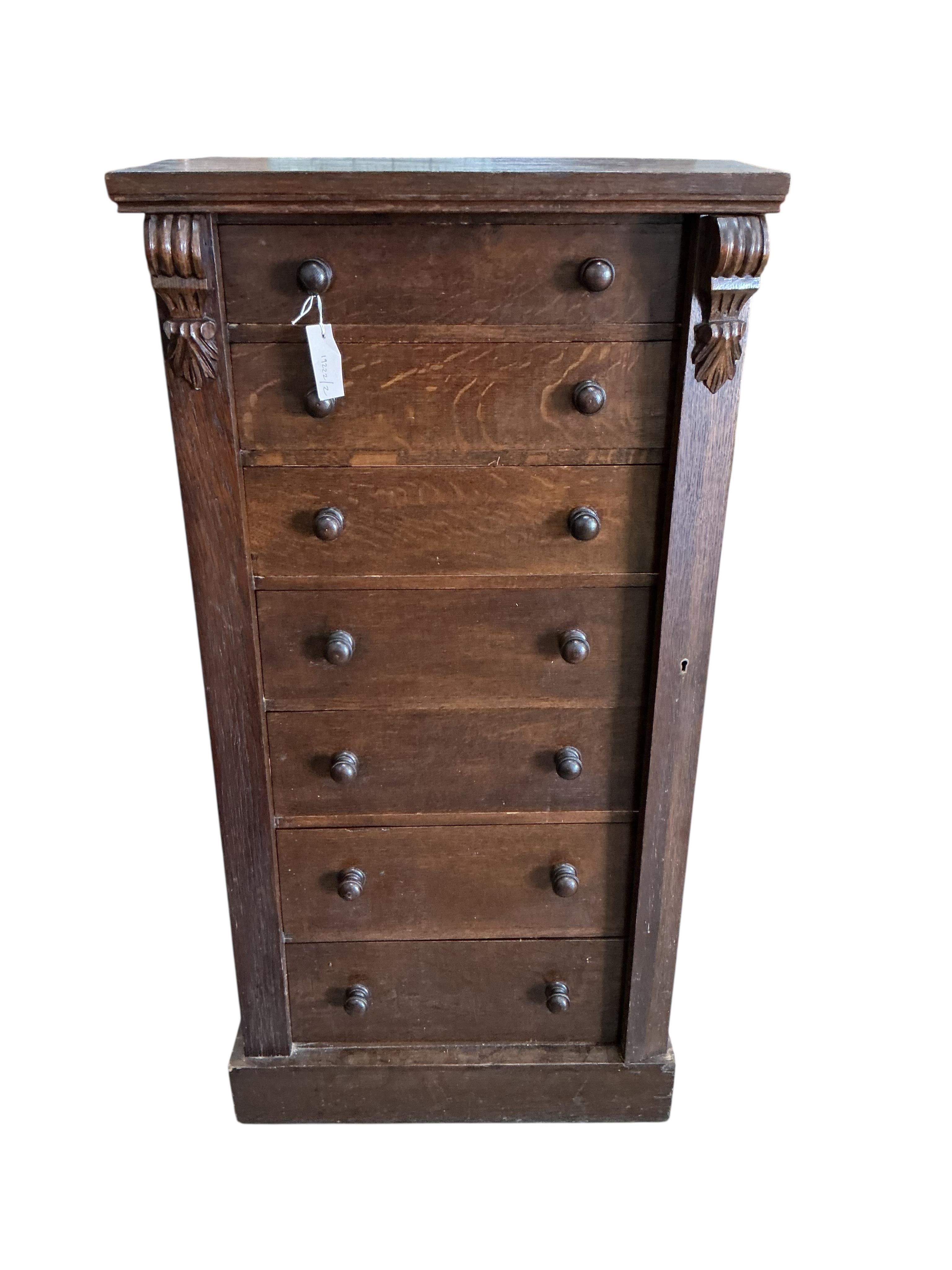 A late Victorian oak Wellington chest, width 61cm, depth 43cm, height 121cm